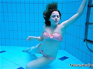 spectacular lady demonstrates wonderful assets underwater