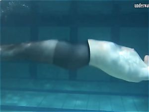 Lozhkova in watch thru cut-offs in the pool